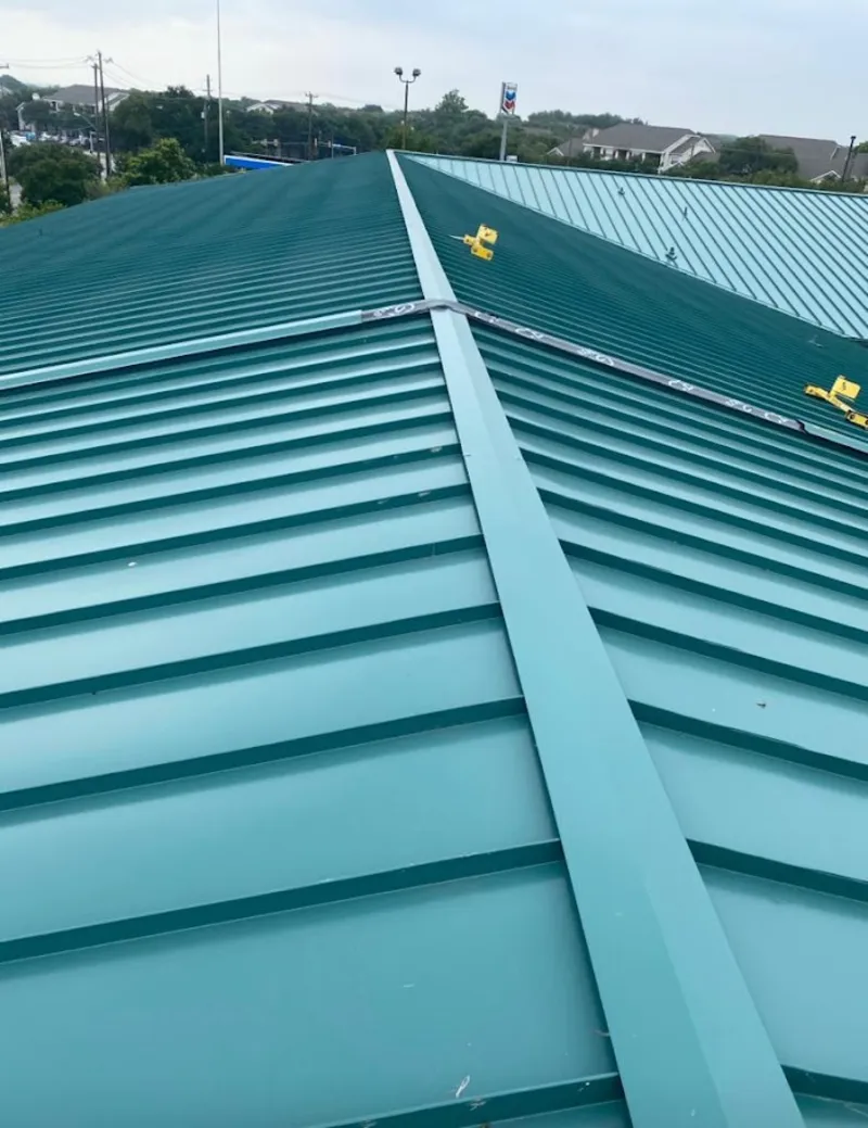 Green commercial metal roof ridge and valley for Metal Roof Repair in Wilson